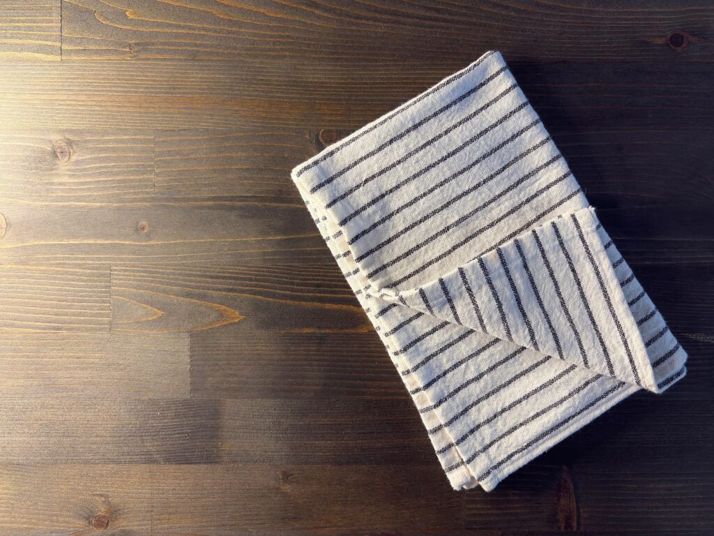 Fabric napkin on the wood background